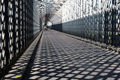 Walkway against sky