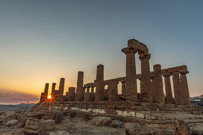 Old ruin building against sky during sunset