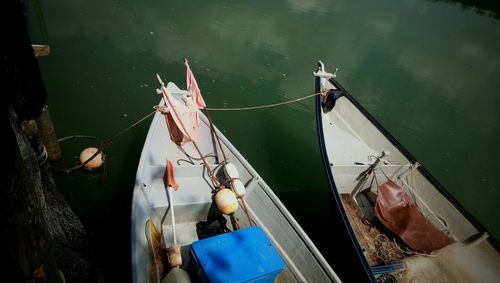 High angle view of fishing net hanging on boat