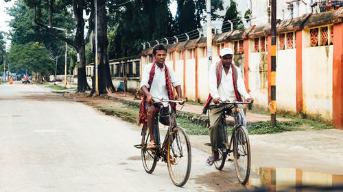 Bicycles parked on street in city