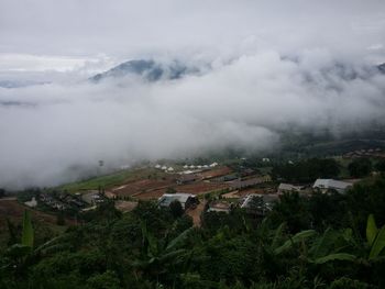 Aerial view of buildings against sky