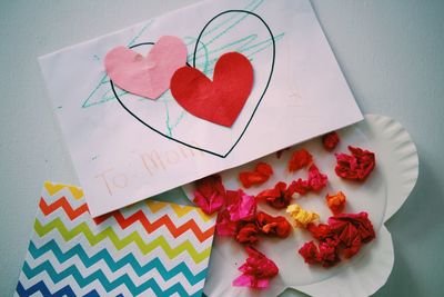 High angle view of heart shaped flowers on table