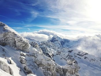 Scenic view of snowcapped mountains against sky