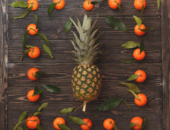 High angle view of orange fruits on table