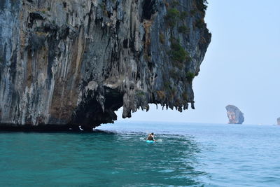 Scenic view of rock formation over sea