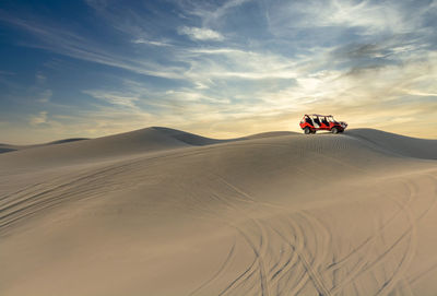 Scenic view of desert against sky