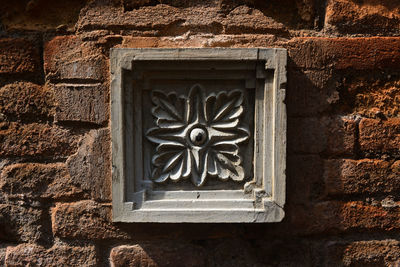 Close-up of ornate window on wall