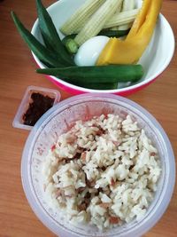 High angle view of chopped vegetables in bowl on table