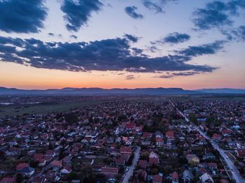 High angle view of townscape against sky during sunset