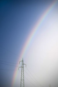 Low angle view of rainbow against sky