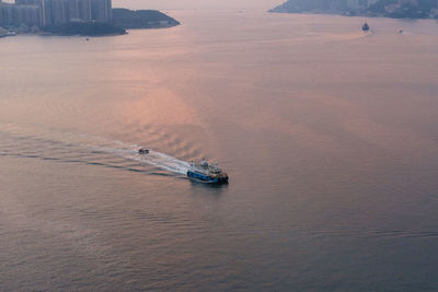 High angle view of ship sailing on sea against sky