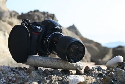 Close-up of camera on rock