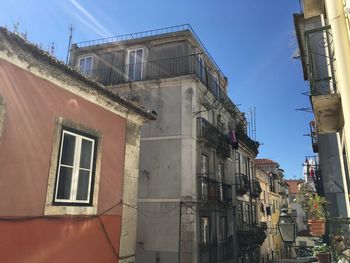 Low angle view of houses against sky