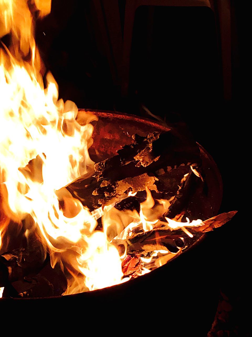 burning, flame, fire - natural phenomenon, heat - temperature, bonfire, glowing, fire, firewood, night, heat, campfire, close-up, orange color, motion, illuminated, dark, no people, fire pit, lit, focus on foreground