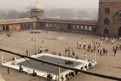 High angle view of people in town square