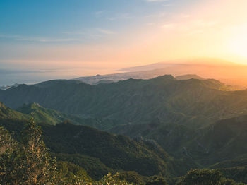 Scenic view of mountains against sky during sunset