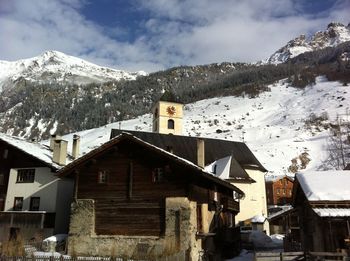 Buildings against sky during winter