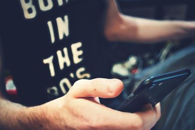 Close-up of person hand on the road