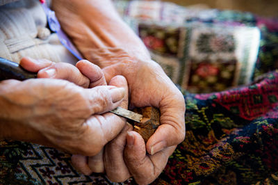 Close-up of woman holding hands