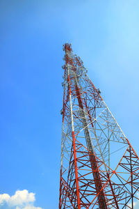 Low angle view of communications tower against sky