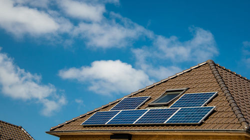 Low angle view of solar panel against sky