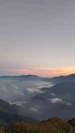 Scenic view of landscape against sky during sunset