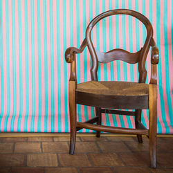 Close-up of chair on table at home