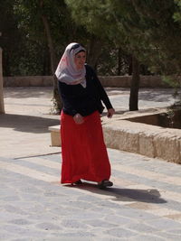 Woman with red umbrella