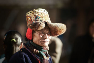 Portrait of woman looking at camera