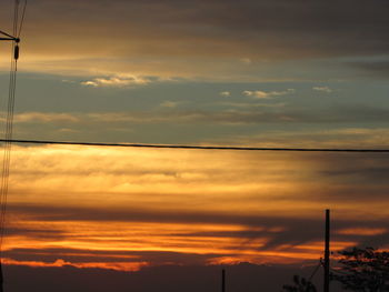 Low angle view of dramatic sky during sunset