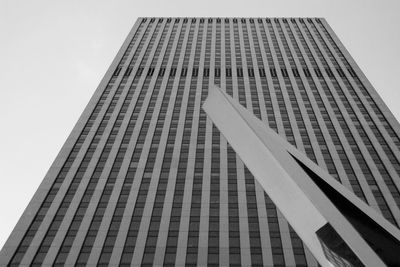 Low angle view of modern building against clear sky