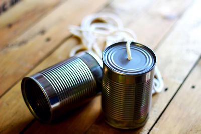 Tin can phone on table