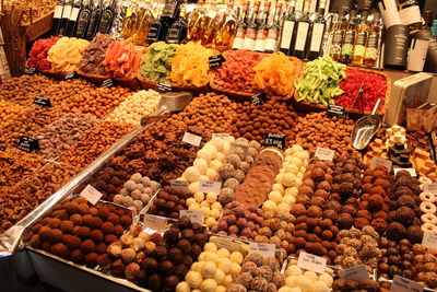 Various fruits and chocolats for sale at market