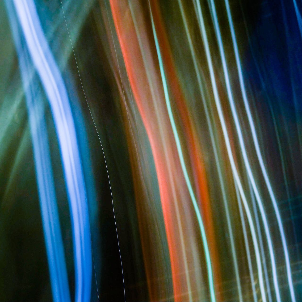 long exposure, motion, speed, blurred motion, multi colored, light trail, abstract, illuminated, backgrounds, full frame, glowing, no people, night, rainbow, pattern, light - natural phenomenon, low angle view, outdoors, transportation, glass - material