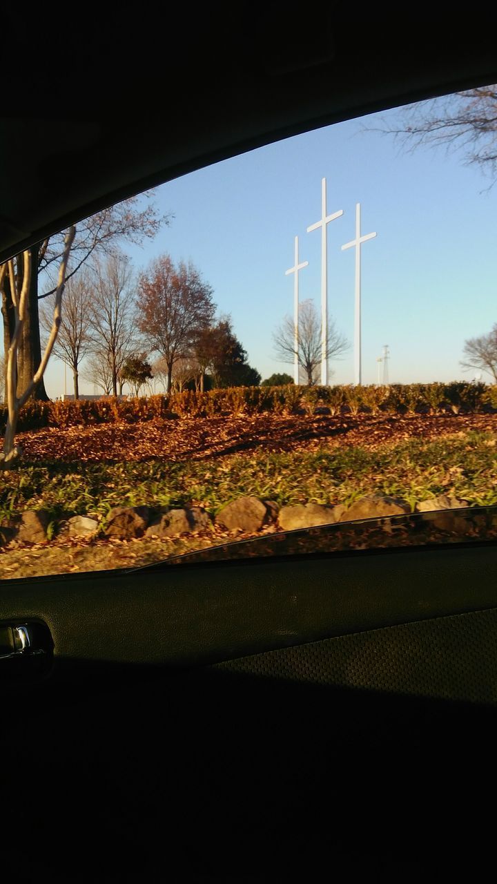 VIEW OF CAR ON ROAD