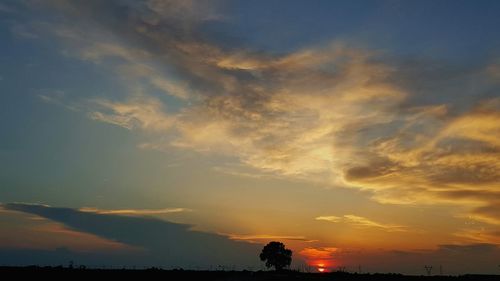 Low angle view of dramatic sky during sunset