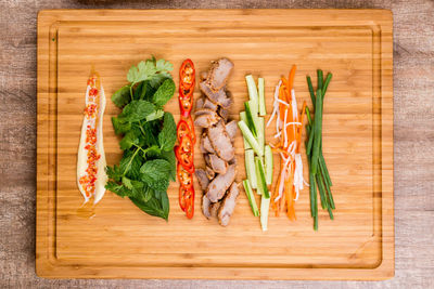 High angle view of vegetables on cutting board