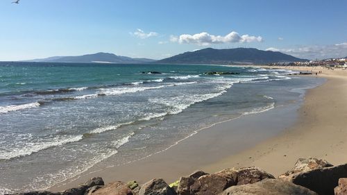 Scenic view of beach against sky
