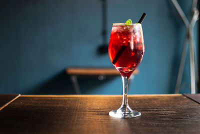 Close-up of wineglass on table