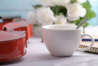 Close-up of coffee cup on table