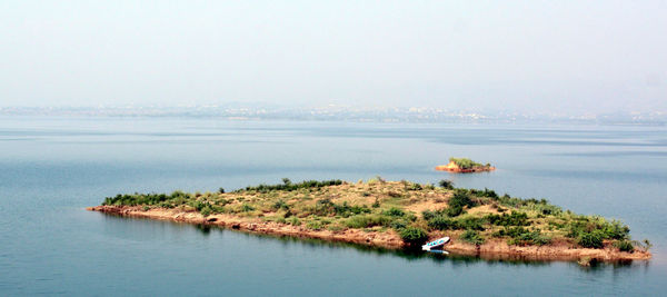 Scenic view of island against sky