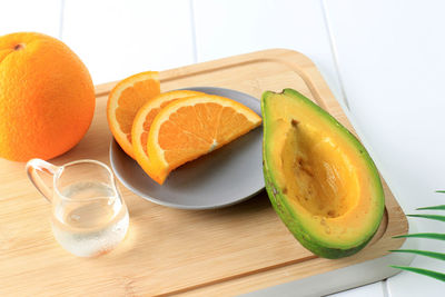 Fresh ingredient making fresh juice, orange navel and avocado