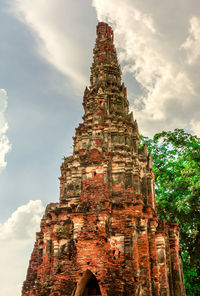 Low angle view of old building in ayutthaya province under the blue sky