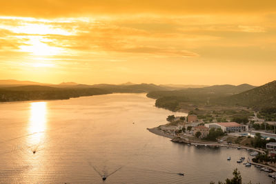 Scenic view of sea against sky during sunset