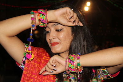 Close-up of beautiful young woman wearing traditional clothing at event