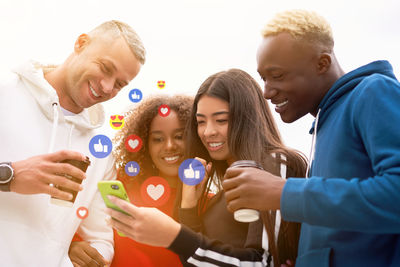 Group of people against friends