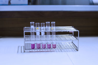 Close-up of test tubes on table