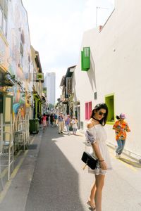 Young woman standing on street