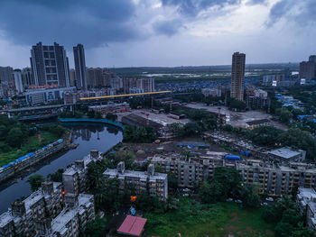 High angle view of buildings against sky in city