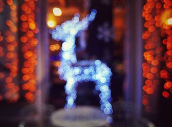 Close-up of illuminated christmas tree at night